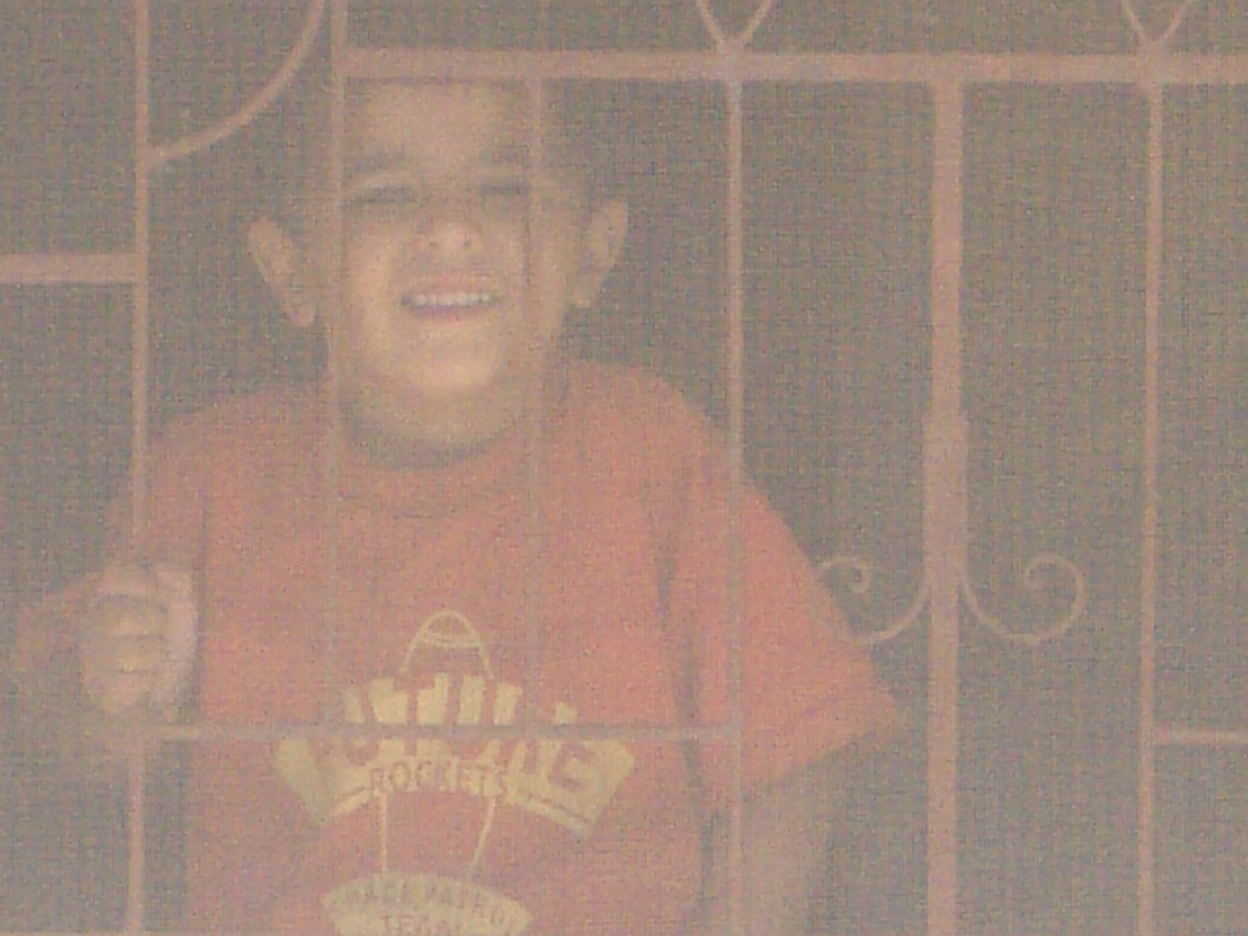 Hussein looks out his door.