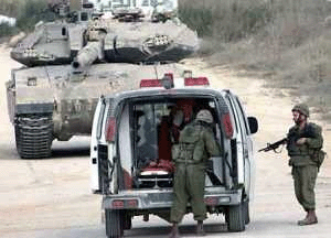 An ambulance is detained and checked at a checkpoint in Nablus.