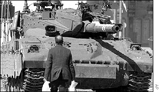 Tanks kick up dust as they enter Gaza.